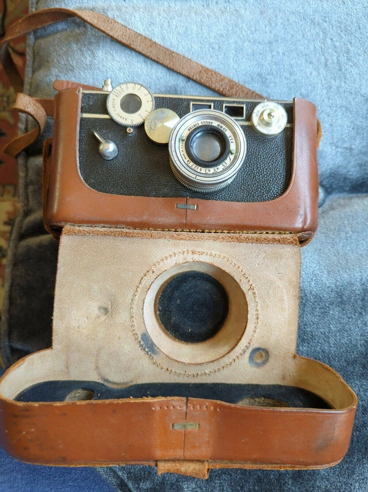 Vintage Argus Cintar 50mm lense Camera In Leather Casing