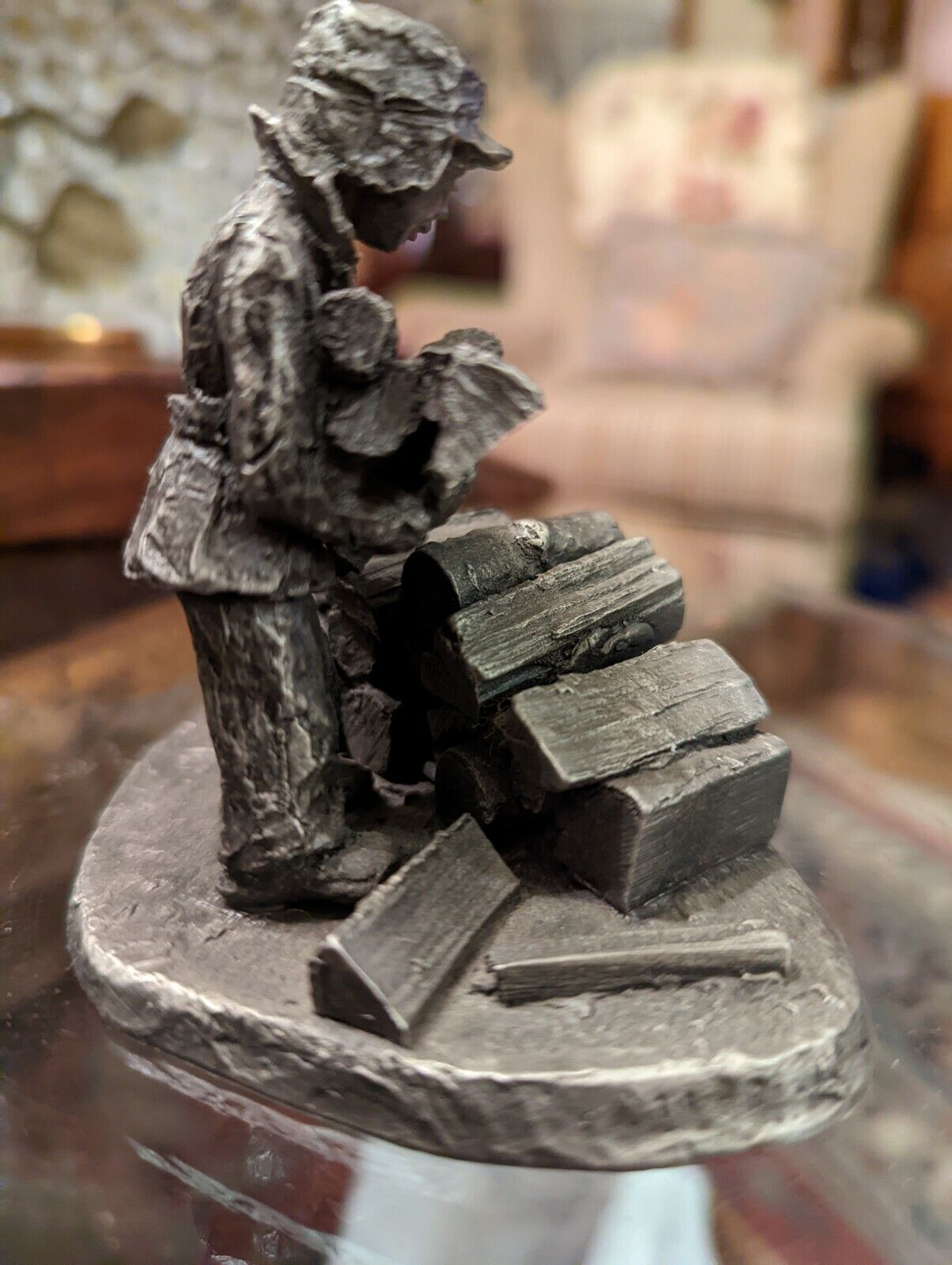 International Pewter Man Pilling Wood Logs Figurine