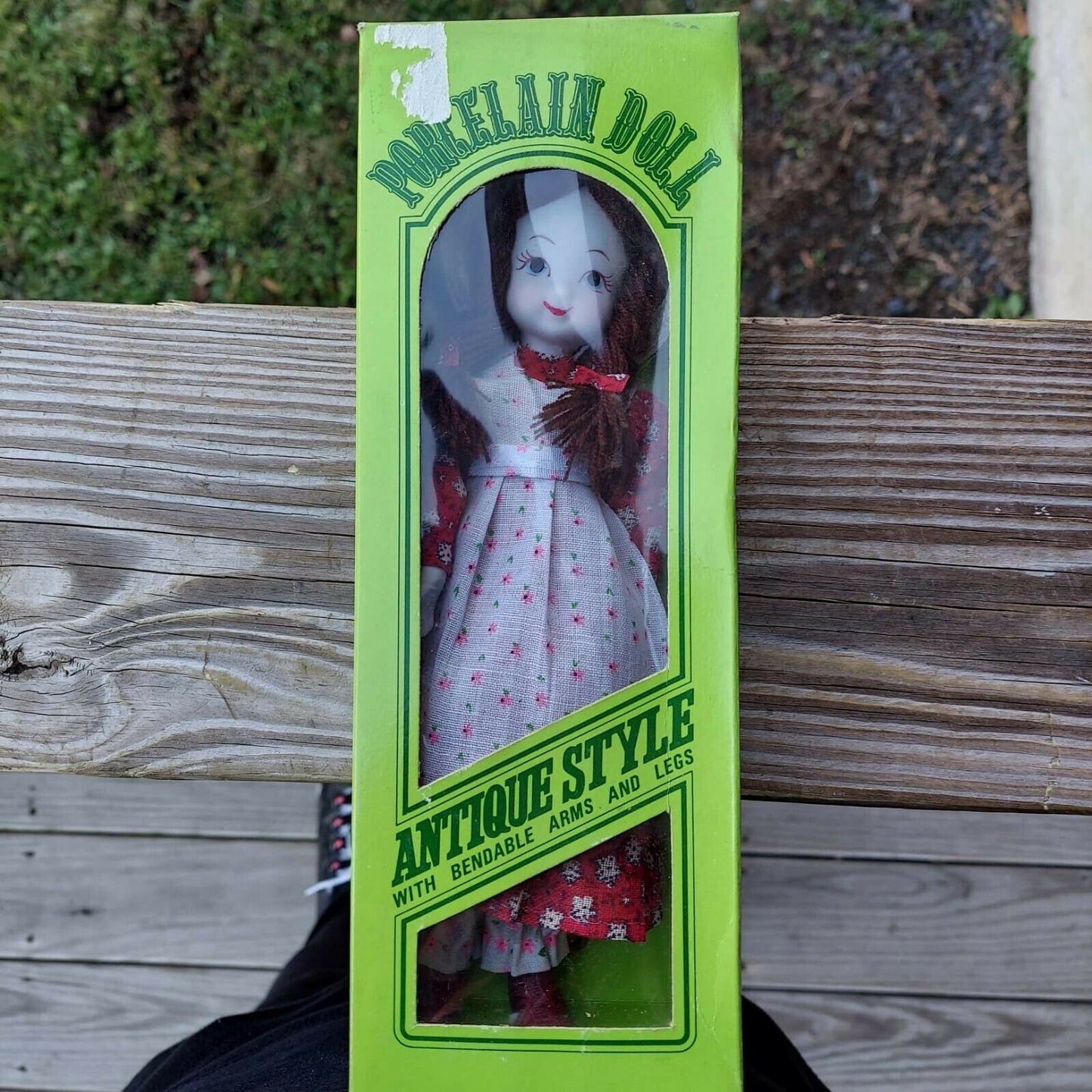 Porcelain Doll Antique Style  9" hight new in box.