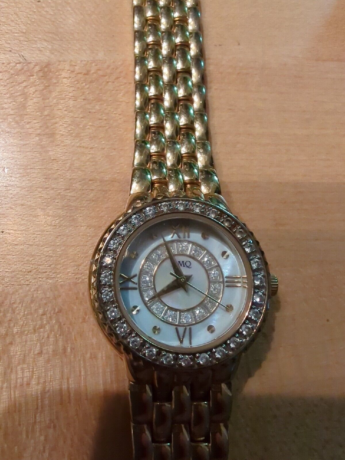 DMQ cz Ladies Gold Tone Mother of Pearl Watch - Model DQ1183