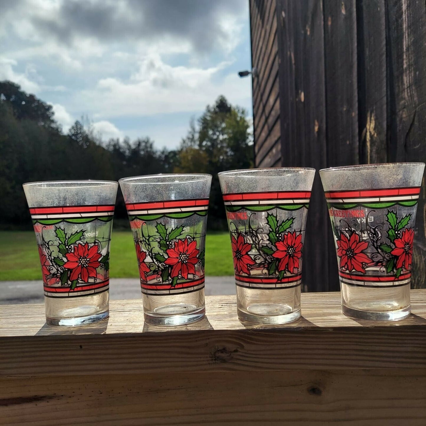 Vintage Set Of four Coca Cola Seasons Greetings Holidays Glasses