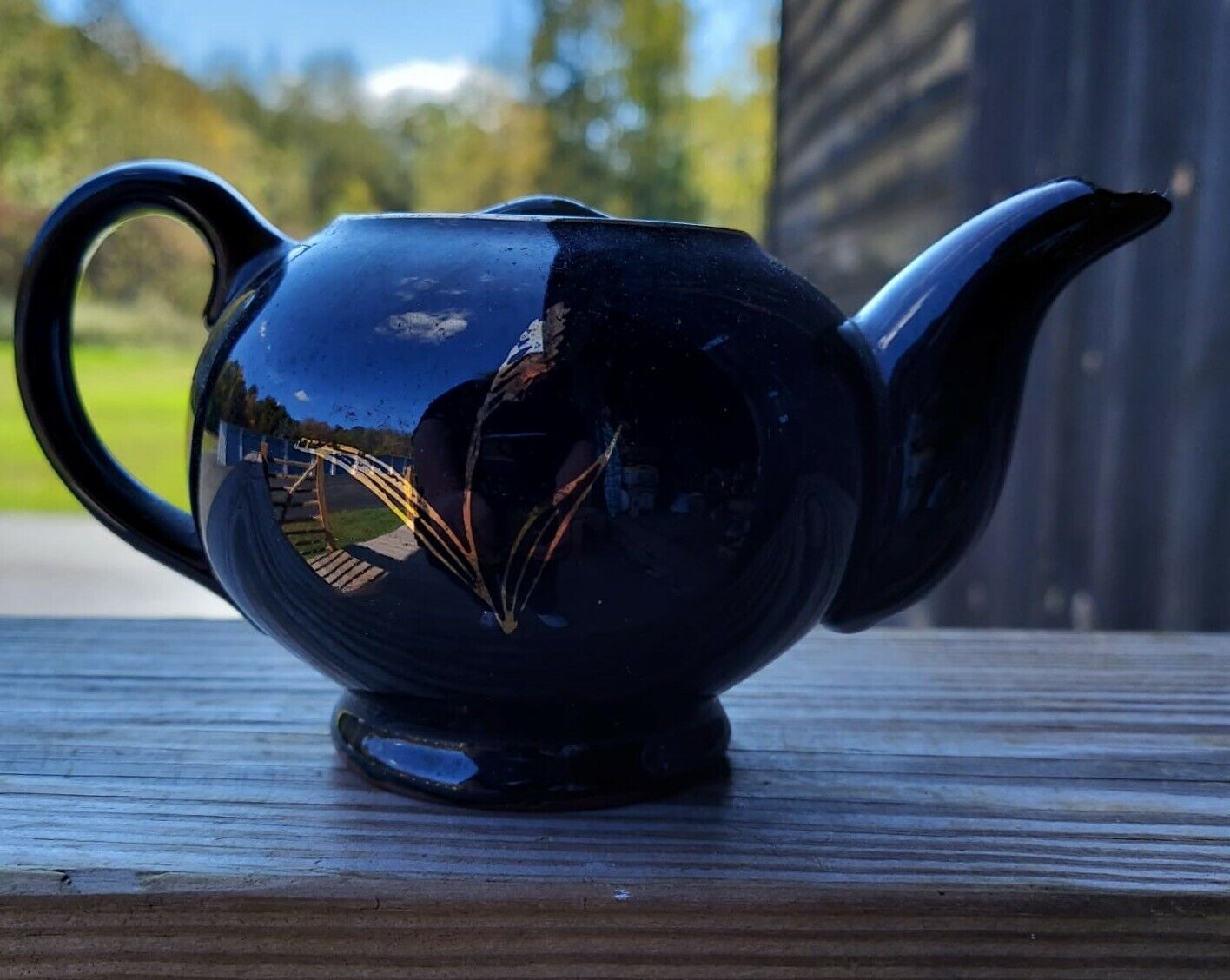 Grant Crest Rockingham Japan Black Glossy Tea Pot With Gold Trim And Designs.