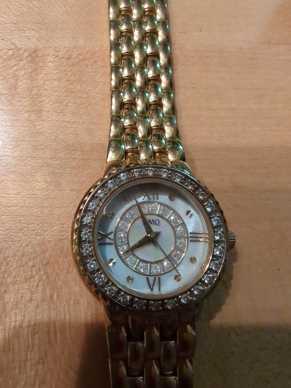 DMQ cz Ladies Gold Tone Mother of Pearl Watch - Model DQ1183