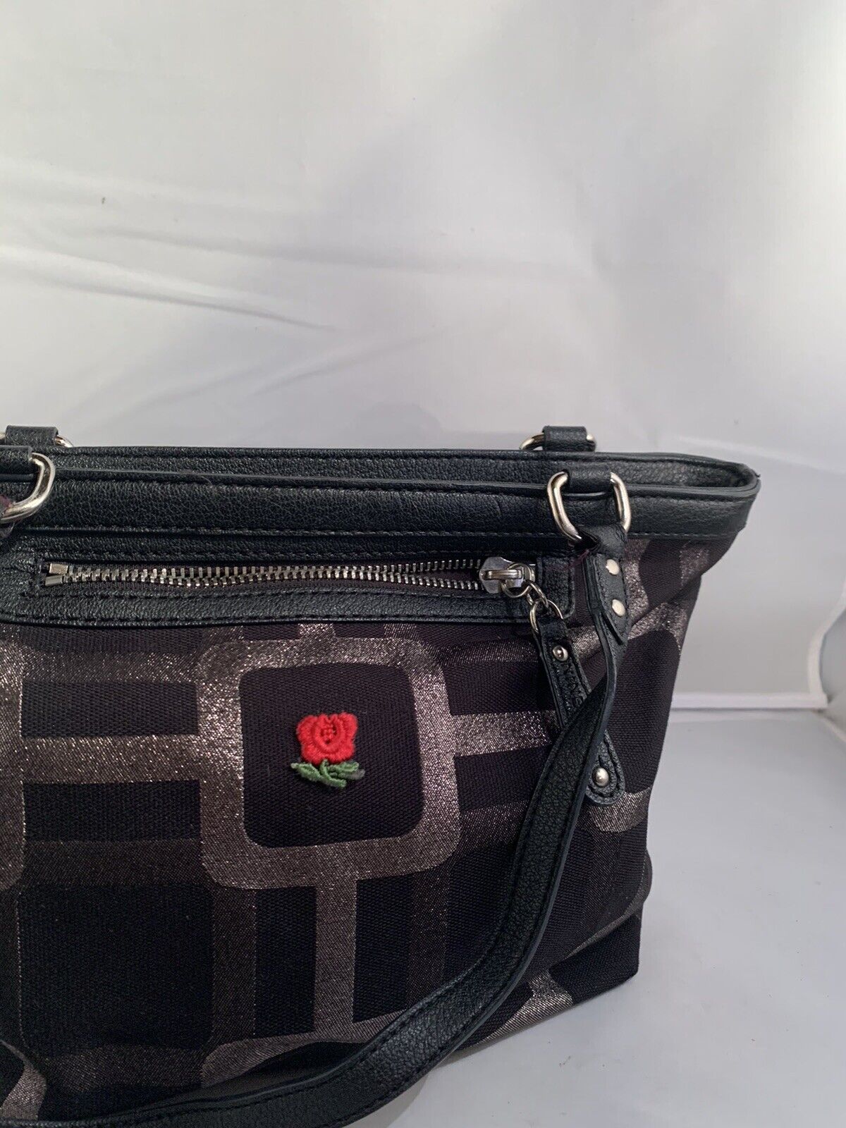 Nine West Black Shimmer Purse With A Rose