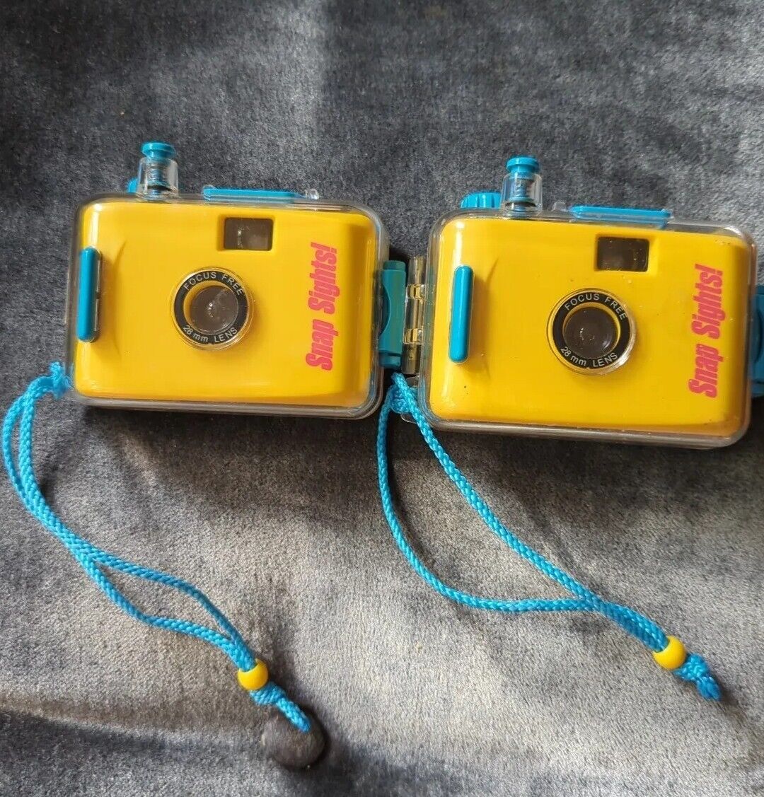 Two Snap Sights Underwater Film Cameras Used