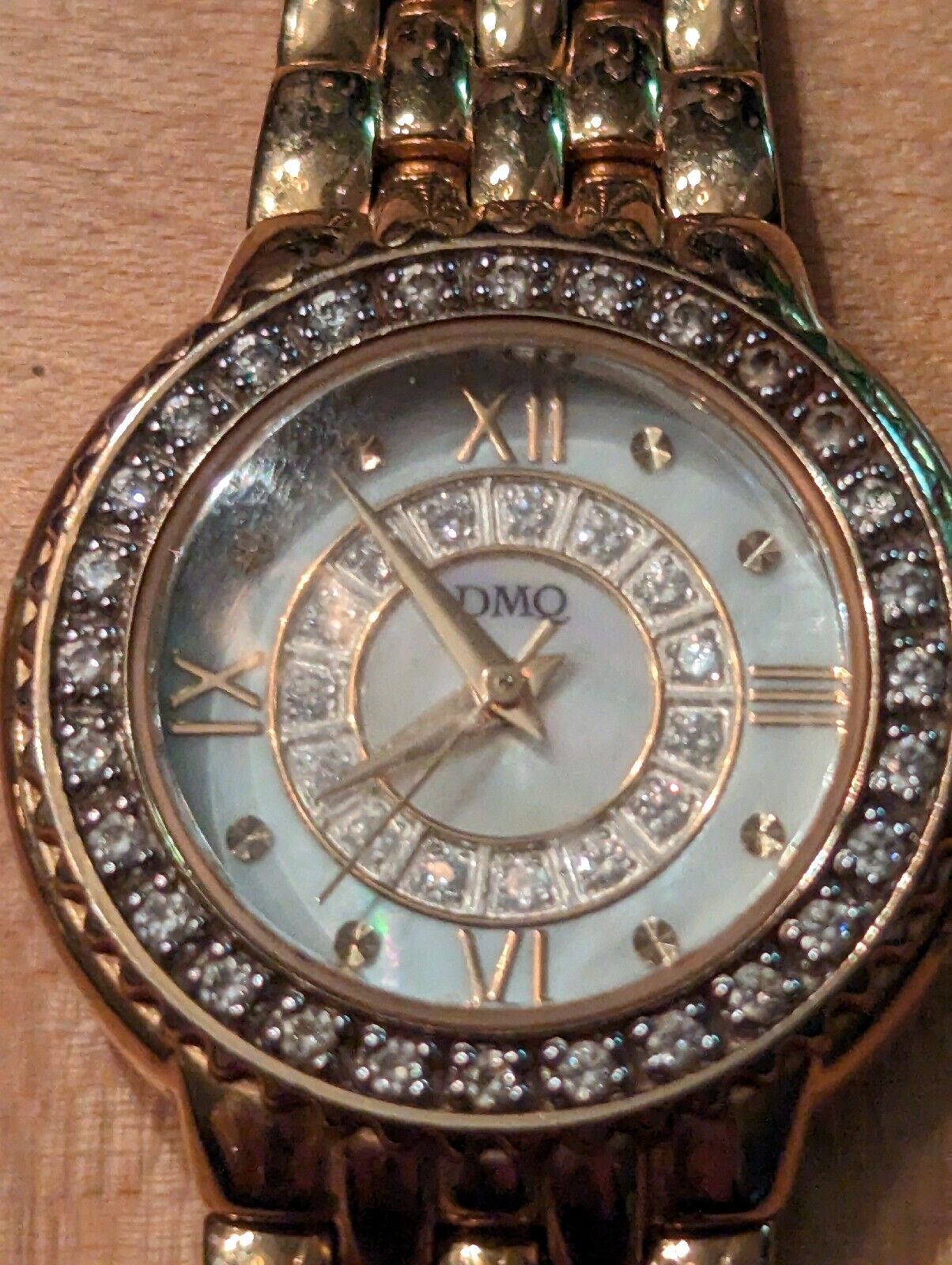 DMQ cz Ladies Gold Tone Mother of Pearl Watch - Model DQ1183