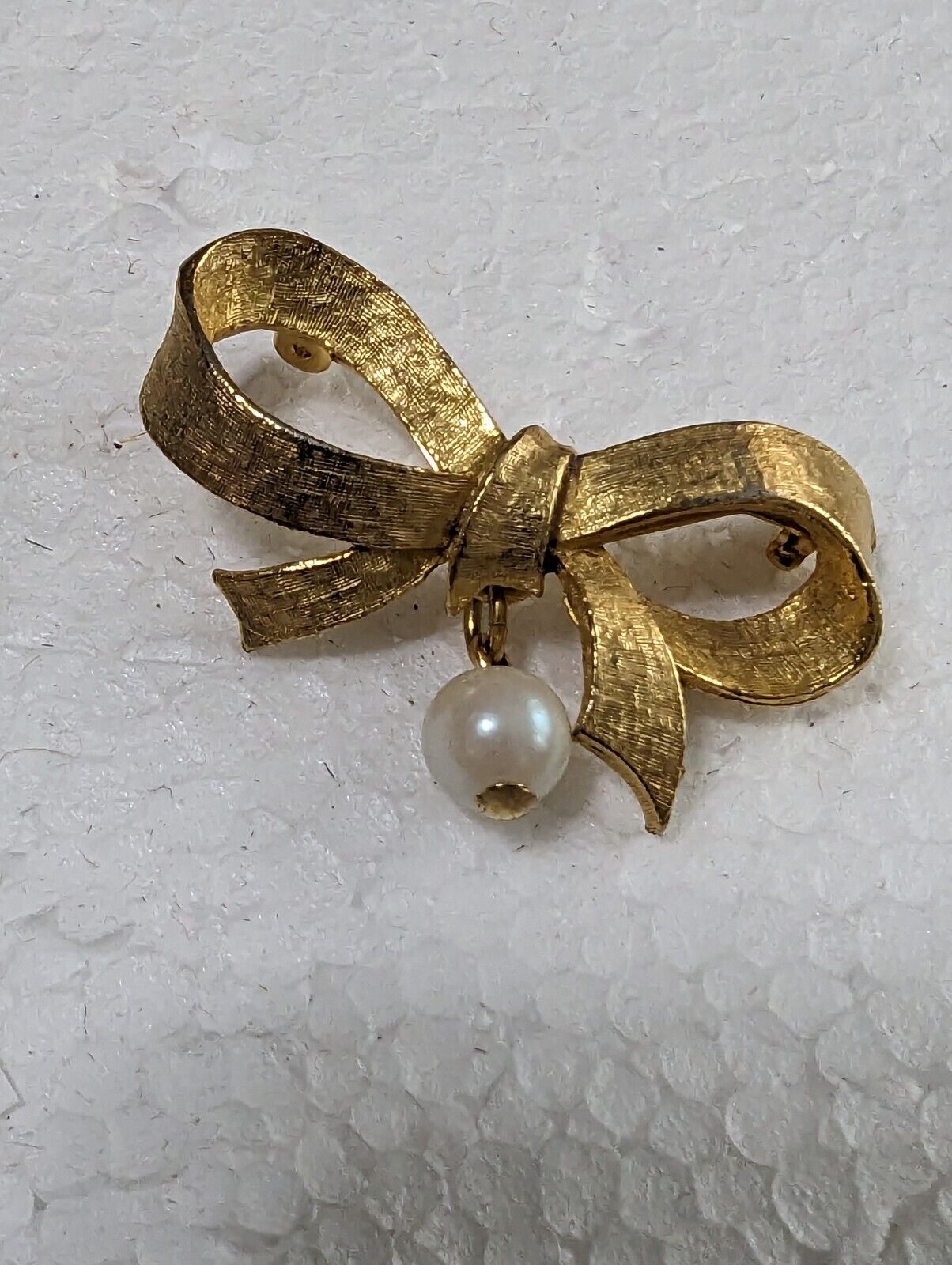 Vintage DUBARRY Gold Tone Ribbon With A Dangling Pearl