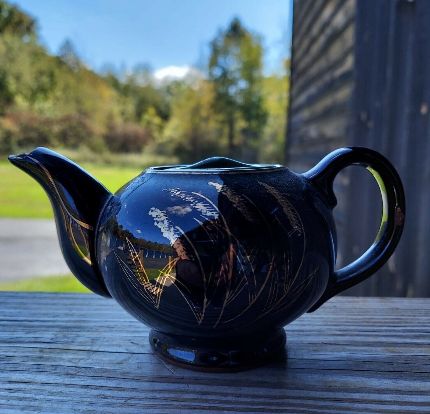 Grant Crest Rockingham Japan Black Glossy Tea Pot With Gold Trim And Designs.