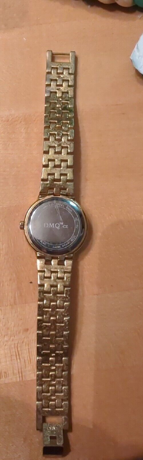 DMQ cz Ladies Gold Tone Mother of Pearl Watch - Model DQ1183